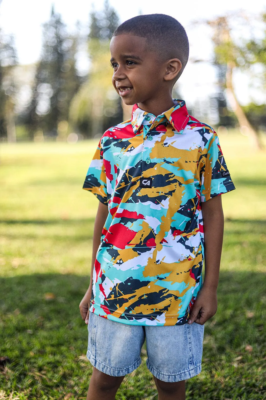 CA JNR Funky Golf Shirt | Splashes & Smudges